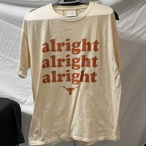 Cream T-Shirt with Orange Print.  Never worn.